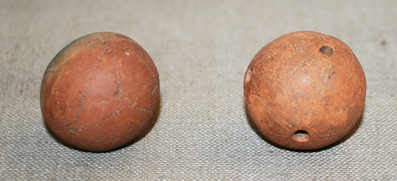 Clay rattle balls were unearthed at the Daxi Culture Heritage Site in Wushan County, Chongqing in 1959. /CFP