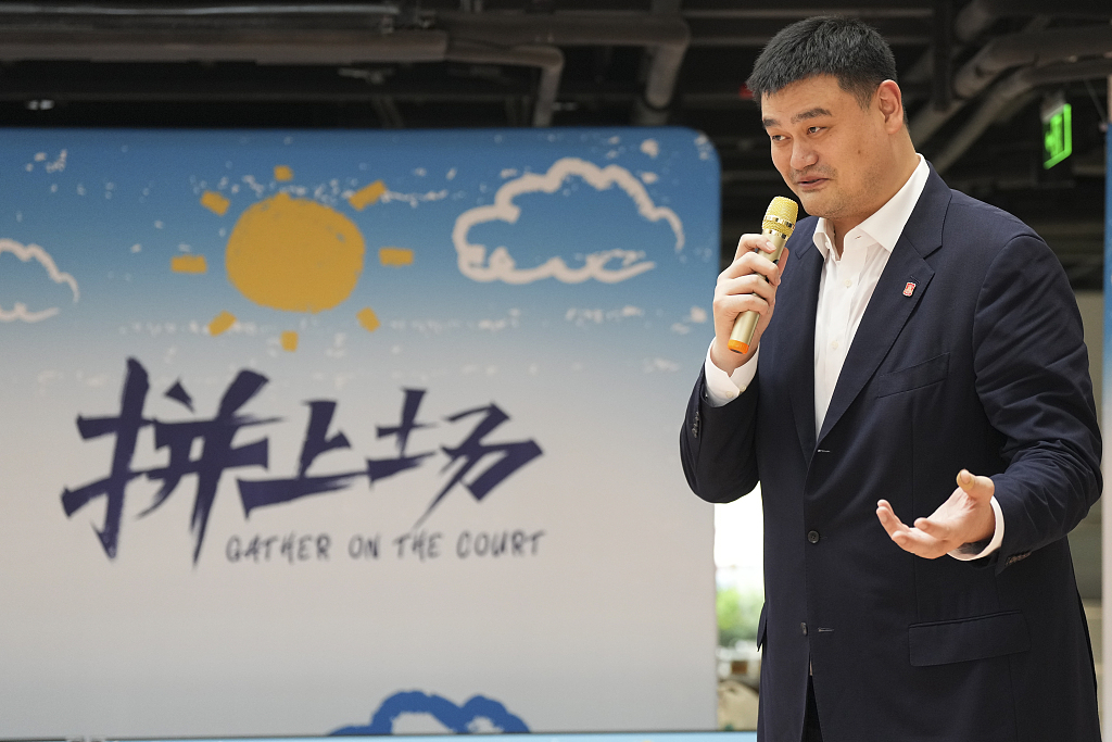 Yao Ming, president of the Chinese Basketball Association, speaks in the 