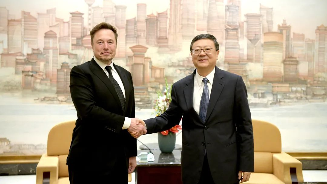 Chen Jining (R), secretary of the Shanghai Municipal Committee of the Communist Party of China, shakes hands with Tesla CEO Elon Musk in Shanghai, China, June 1, 2023. /Shanghai Municipal Government
