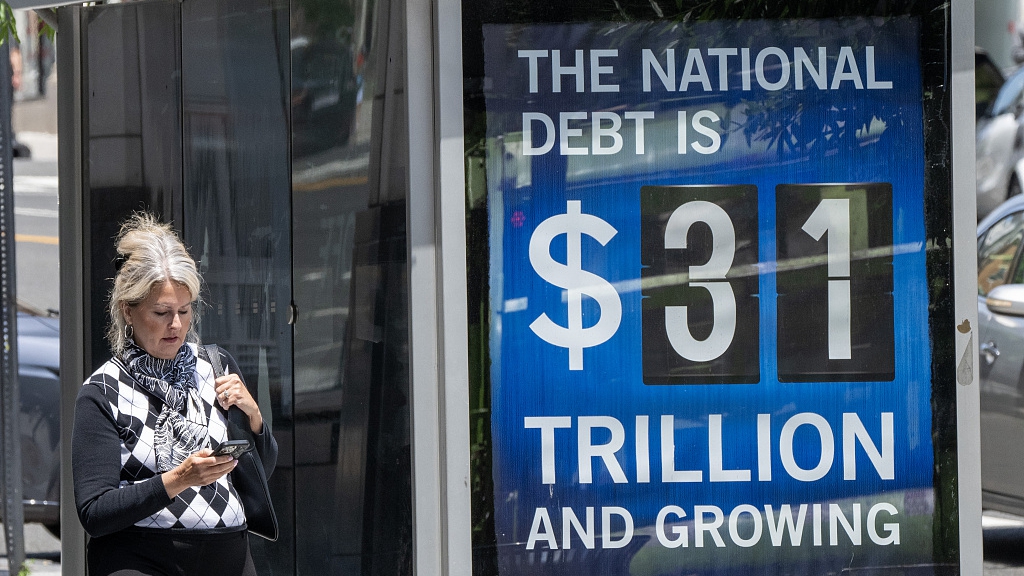 A sign keeps track of the U.S. debt, now at $31 trillion, in downtown Washington, D.C., U.S., May 30, 2023. /CFP