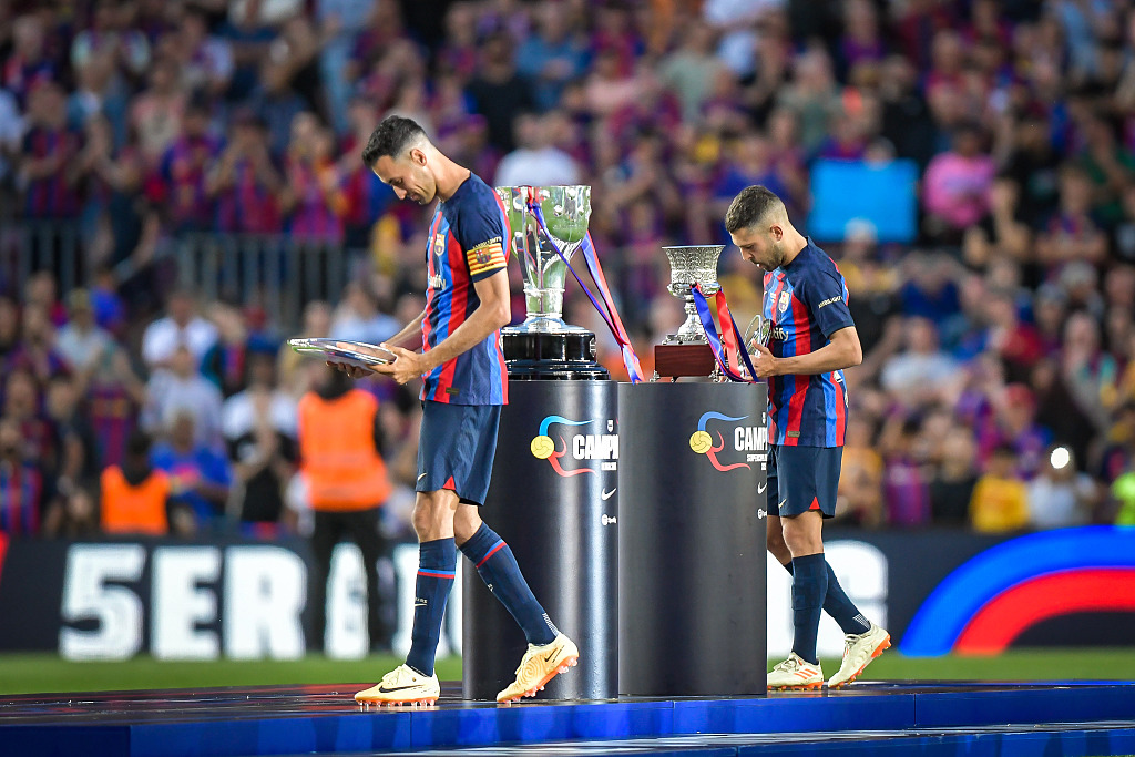 Sergio Busquets (L) and Jordi Alba of Barcelona attend their home stadium farewell ceremony after the 3-0 win over Mallorca at Spotify Camp Nou in Barcelona, Spain, May 28, 2023. /CFP