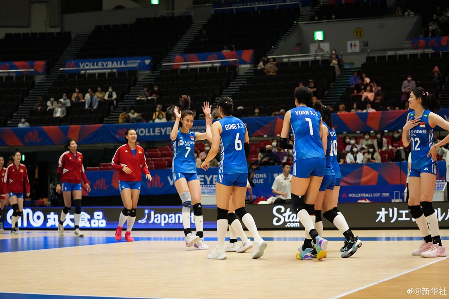 Chinese players celebrate the win against Team Germany at the FIVB Volleyball Nations League in Nagoya, Japan, June 2, 2023. /Xinhua
