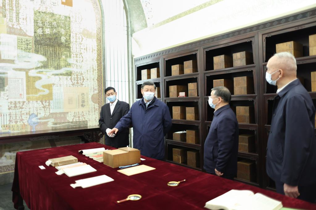 Chinese President Xi Jinping (2nd L) visits an exhibition hall of the China National Archives of Publications and Culture and learns about the preservation of classic publications in its collection in Beijing, China, June 1, 2023. /Xinhua