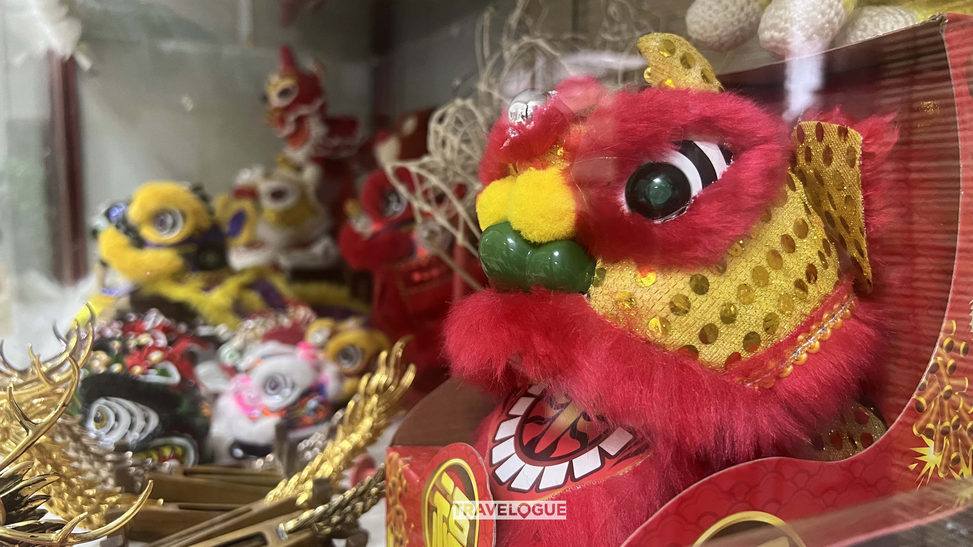 This undated photo shows lion dance heads made by the Li family in Foshan, south China's Guangdong Province. /CGTN