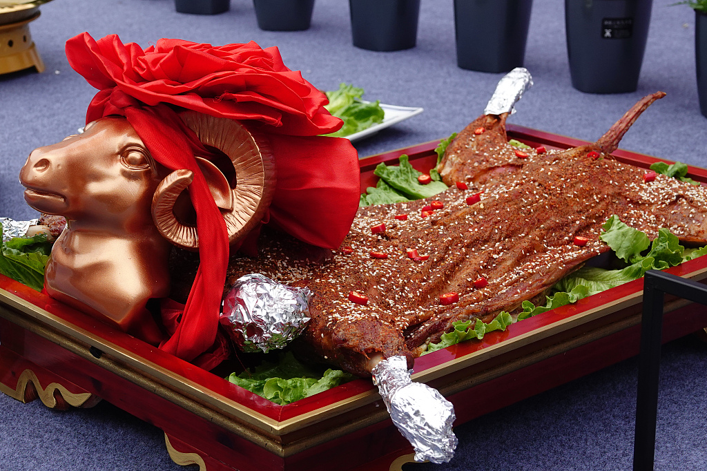 A whole roasted lamb is seen at a culinary arts competition held in Yichang, central China's Hubei Province, on June 1, 2023. /CFP
