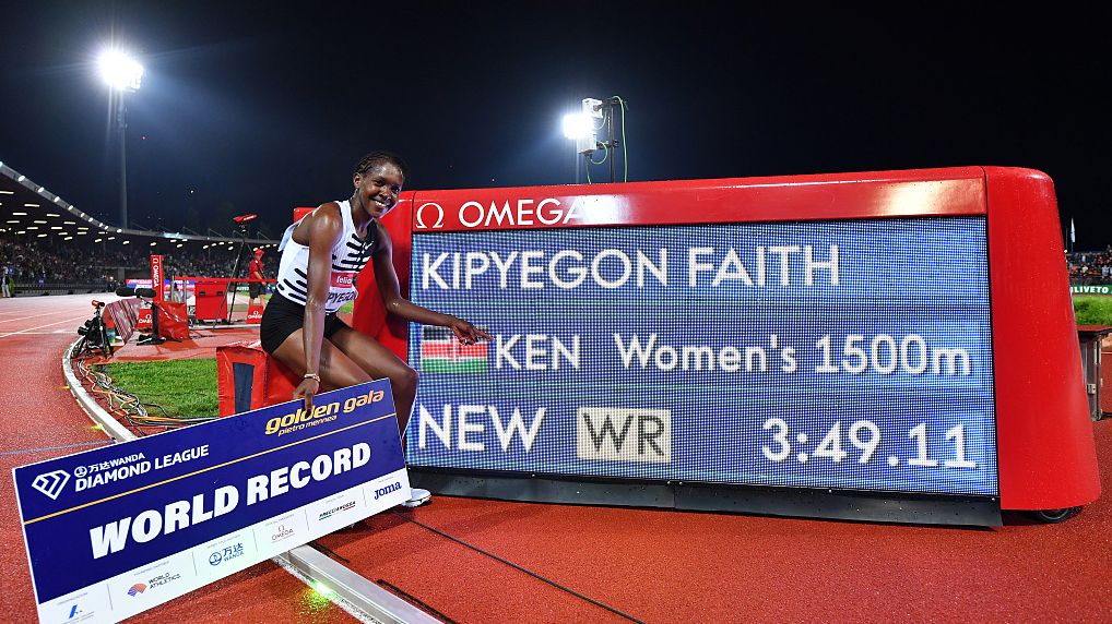 Faith Kipyegon of Kenya poses for a photo after setting a world record in women's 1500m in Florence, Italy, June 2, 2023. /CFP