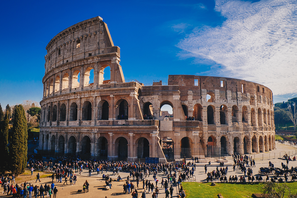 The Colosseum is located in the heart of Rome, Italy. It is the largest ancient amphitheater ever built, and is still the largest standing amphitheater in the world, despite its age. /CFP