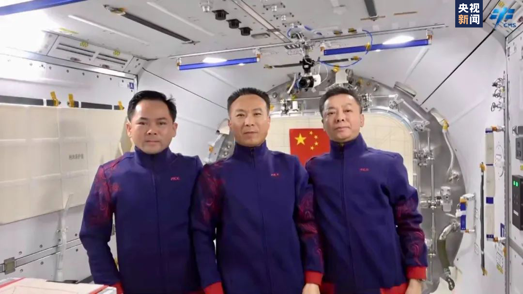 The Shenzhou-15 crew pose for a group photo in the China Space Station. /CMG
