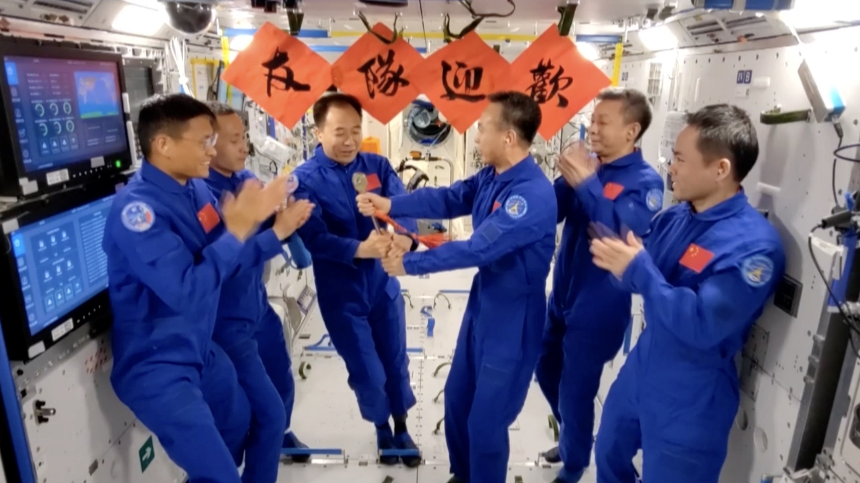 Shenzhou-15 crew hand over the key of China Space Station to Shenzhou-16 crew on June 2 after both joined hands in the station. /CMS