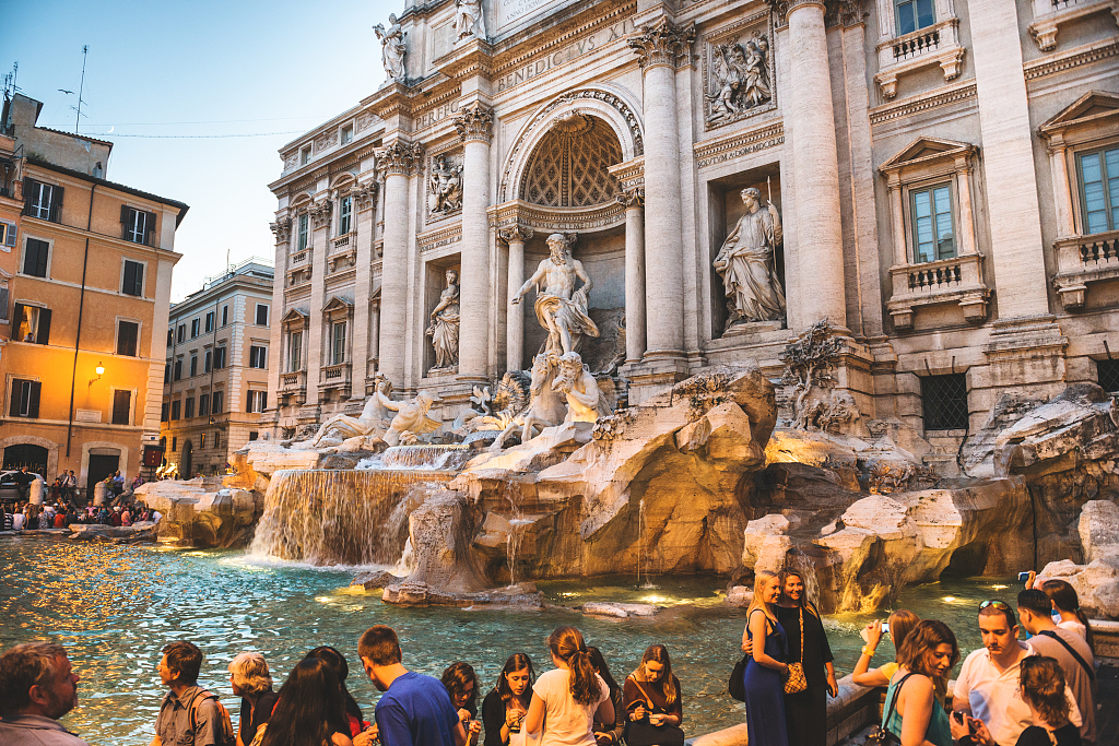 The Trevi Fountain is a popular tourist spot where many visitors throw coins in the hope of finding true love. Every week, the municipality of Rome cleans the coins out from the fountain and donates a large portion of the proceeds to a charity that helps poor families. /CFP