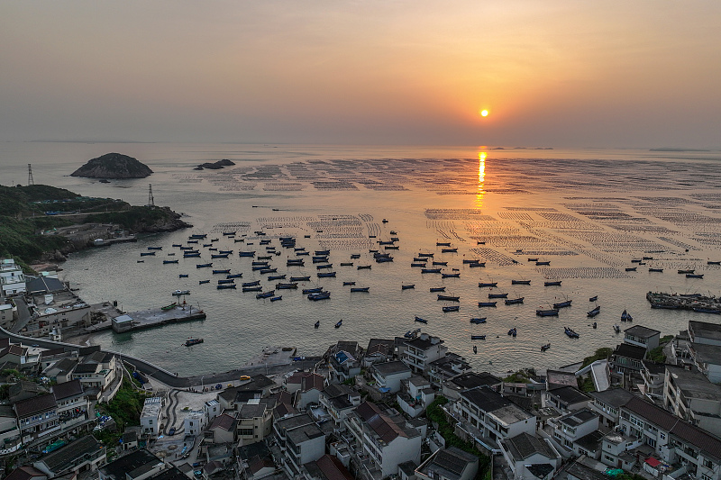 A beautiful sunset view is captured on Gouqi Island, Zhoushan, Zhejiang Province on June 3, 2023. /CFP