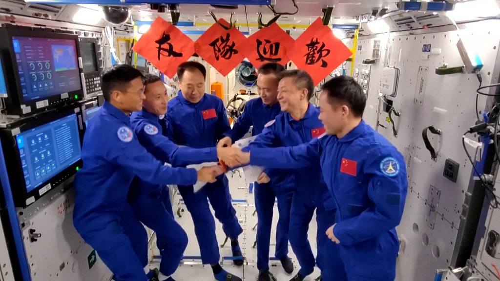 The Shenzhou-15 and Shenzhou-16 crew meet in China's space station, June 2, 2023. /China Manned Space Agency