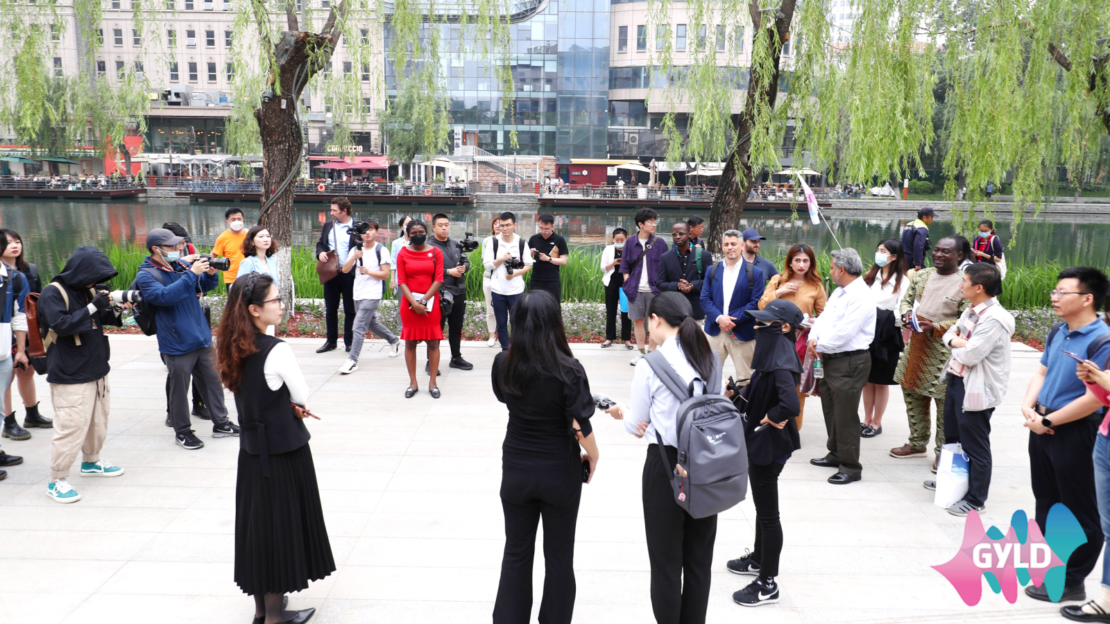 Foreign scholars were shown around the Liangma He Riverfront highlighting its phenomenal transformation as a model urban public space, Chaoyang District, Beijing, May 31, 2023. /CCG