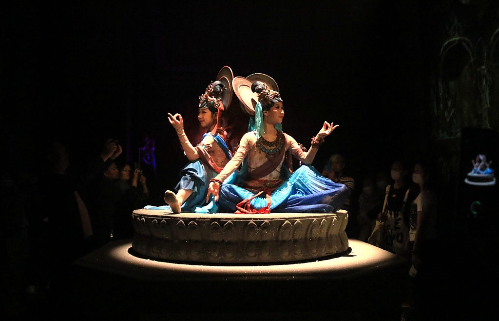Performers showcase Dunhuang music and dance on stage in Jiuquan, Gansu Province on June 3, 2023. /CFP