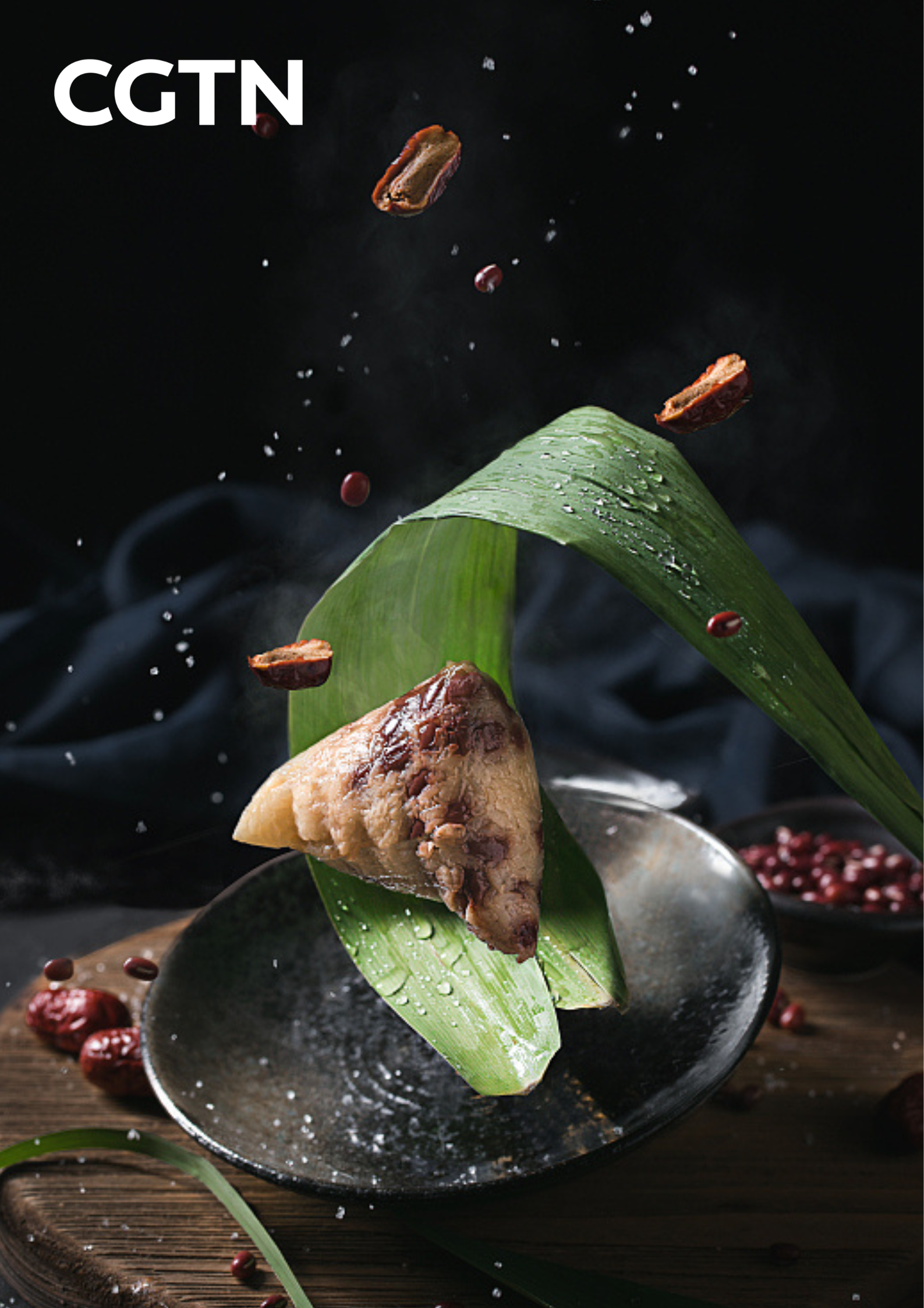 A poster features zongzi, a type of glutinous rice dumpling in China. /CFP