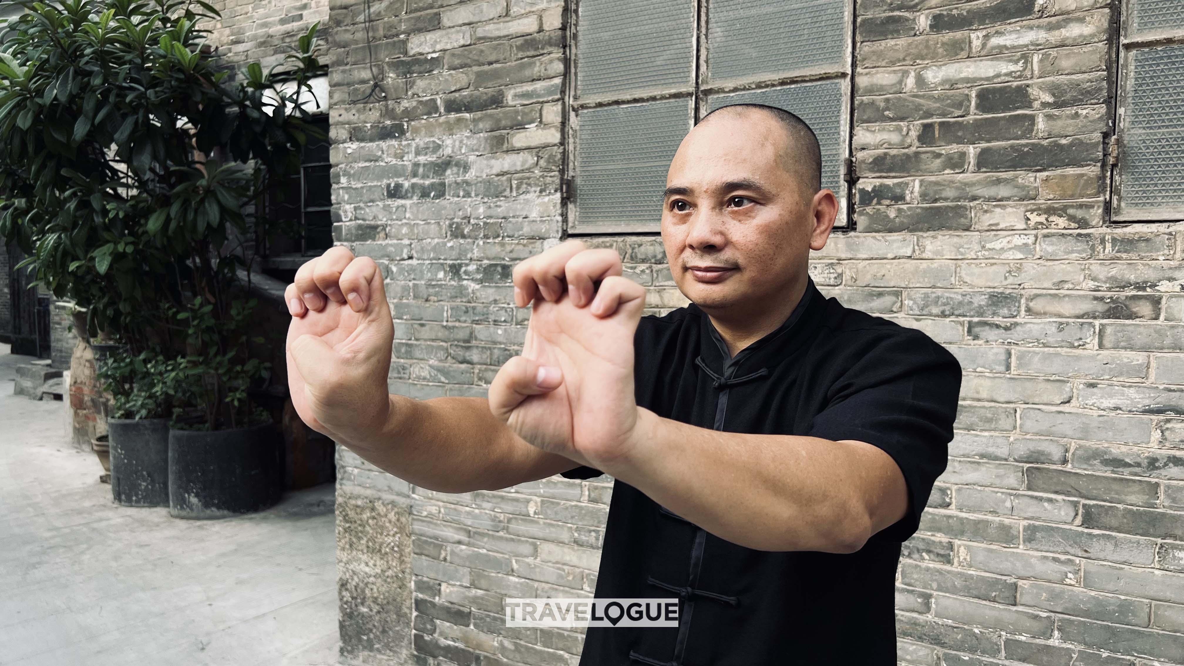 Xian Zhiming practices the snake-style Wing Chun martial arts form in Foshan, south China's Guangdong Province, in this undated photo. /CGTN