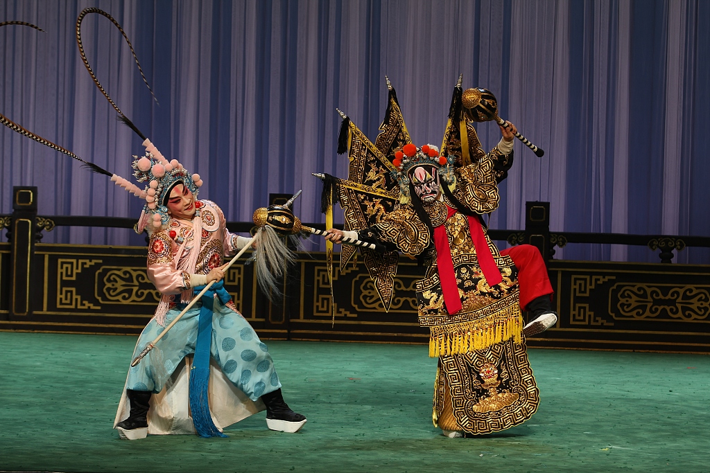 Young students perform the Peking opera 