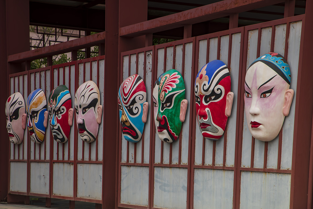 Masks at a scenic spot in Xi'an, Shaanxi Province displaying Peking opera make-up designs, April 17, 2023 /CFP