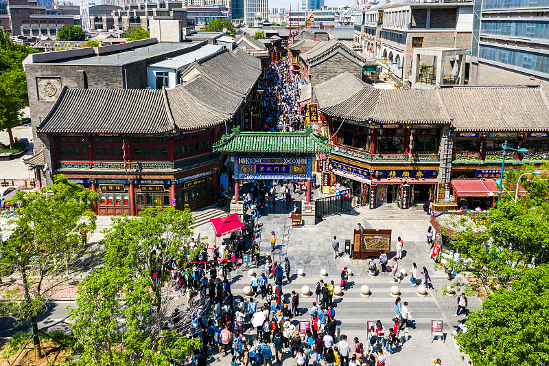 People visit the Tianjin Ancient Cultural Street during a holiday period in Tianjin. /CFP
