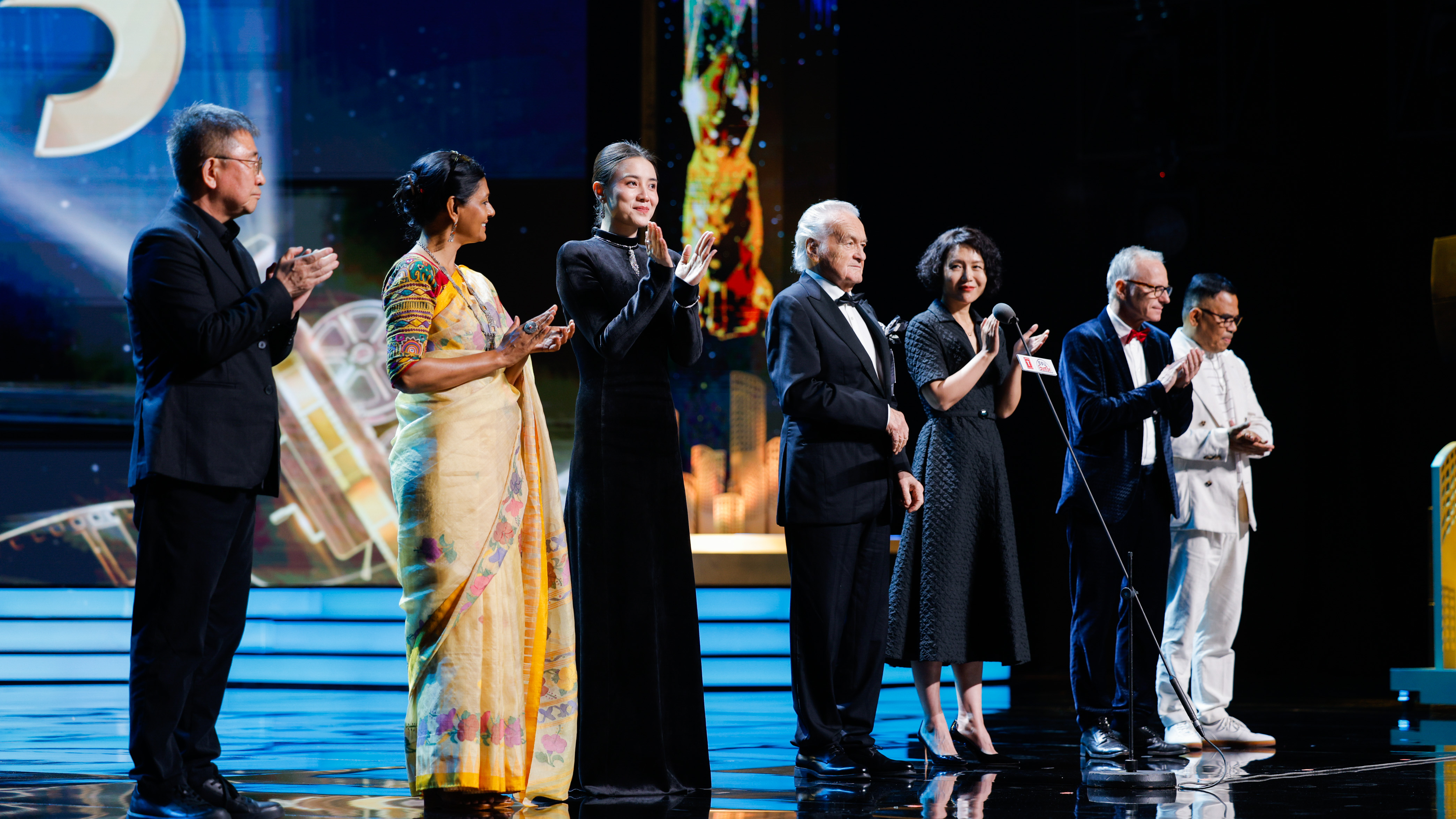 The Jury for the 25th Shanghai International Film Festival Golden Goblet Awards attends the opening ceremony on June 9, 2023. /SIFF