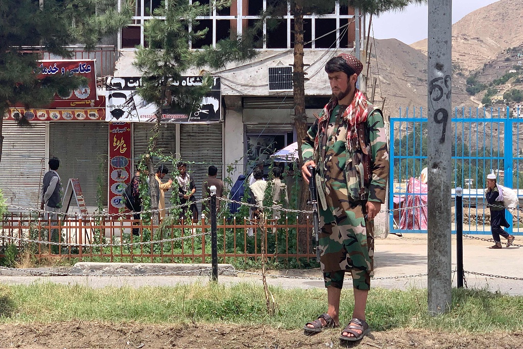 A member of the Taliban stands guard near the site of a suicide attack, where the deputy governor was killed in Faizabad district of Badakhshan province, Afghanistan, June 6, 2023. /CFP