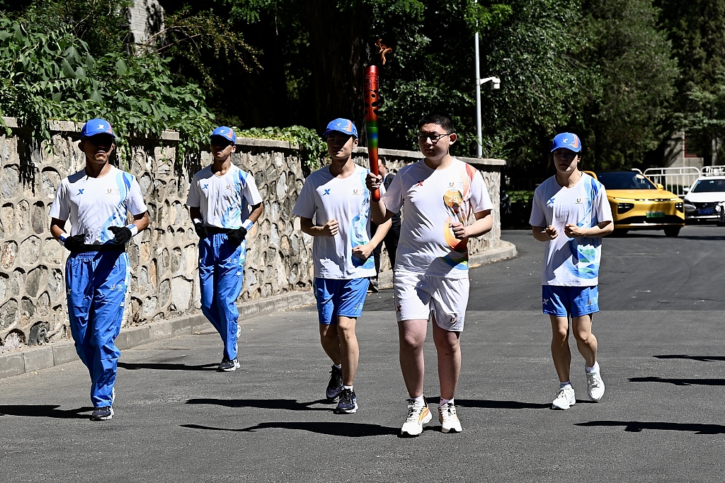 The torch relay for the 31st International University Sports Federation Summer World University Games begins in Beijing, June 10, 2023. /CFP