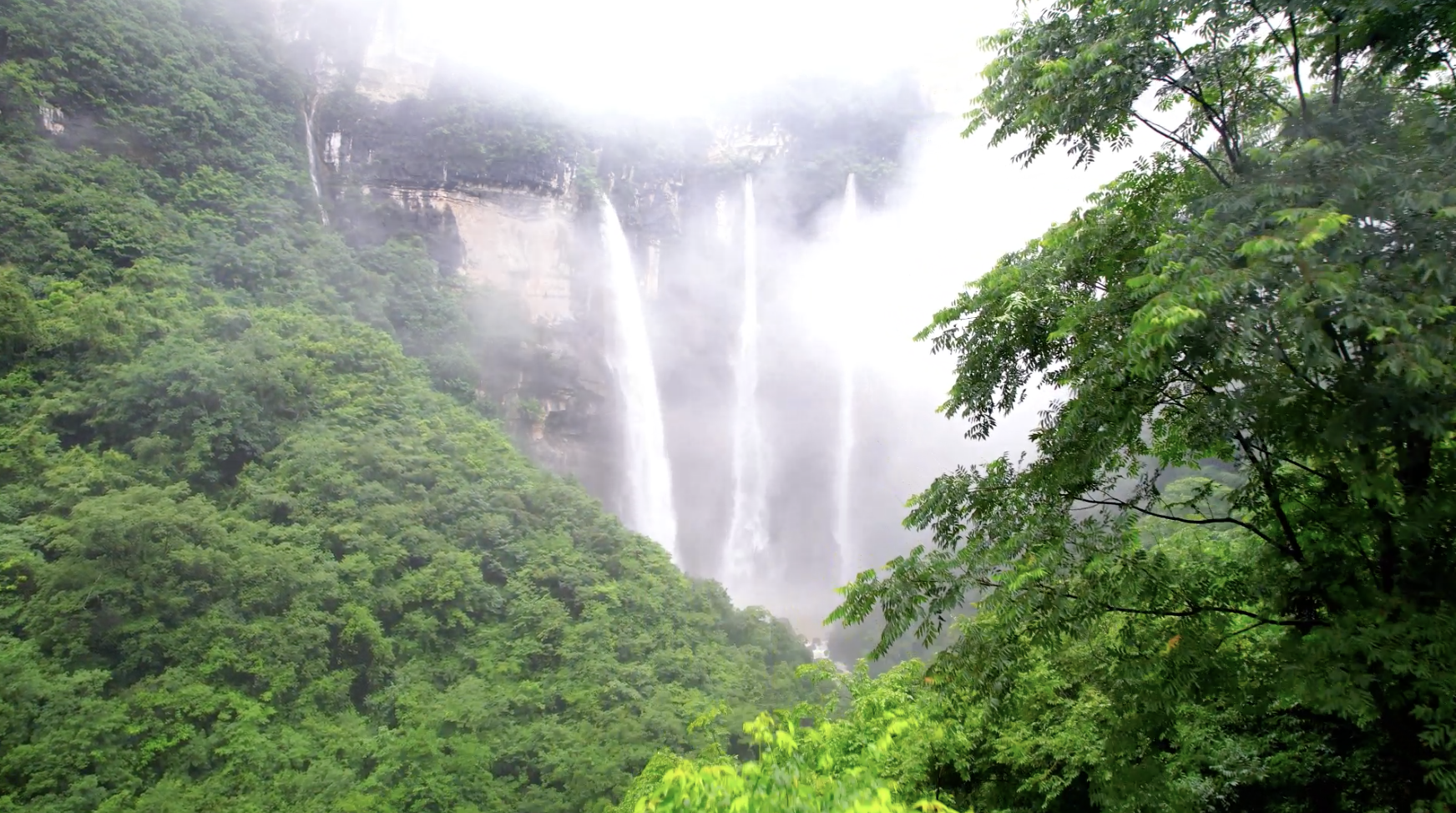 Continuous rainfall creates spectacular triple waterfalls in SW China