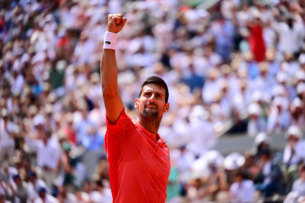 Serbia's Novak Djokovic celebrates a point against Spain's Carlos Alcaraz (not pictured) during their French Open men's singles semifinal in Paris, France, June 9, 2023. /CFP