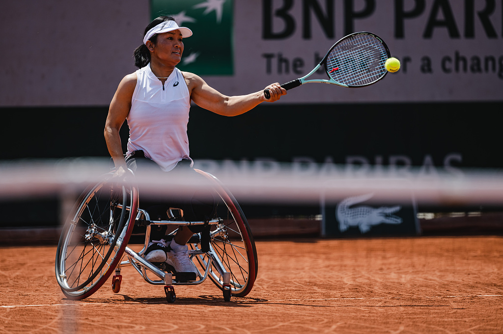 Zhu Zhenzhen of China competes in the French Open wheelchair women's singles first-round match against Yui Kamiji of Japan at Roland Garros in Paris, France, June 6, 2023. /CFP
