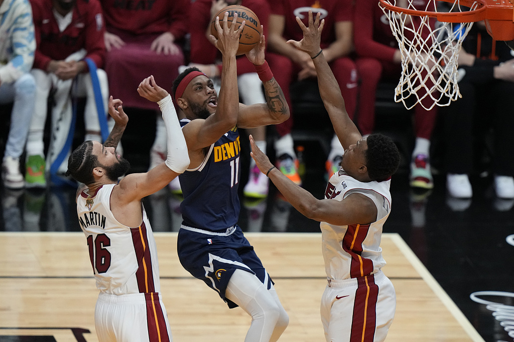 Bruce Brown (#11) of the Denver Nuggets drives toward the rim in Game 4 of the NBA Finals against the Miami Heat at the Kaseya Center in Miami, Florida, June 9, 2023. /CFP