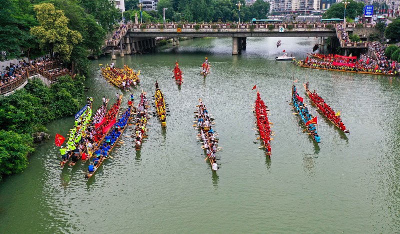 An aerial photo shows a dragon boat competition held in Tongren City, Guizhou Province on June 12, 2023. /CFP