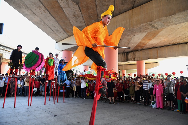 Performers show off their stilt-walking skills in Putian City, Fujian Province on June 12, 2023. /CFP