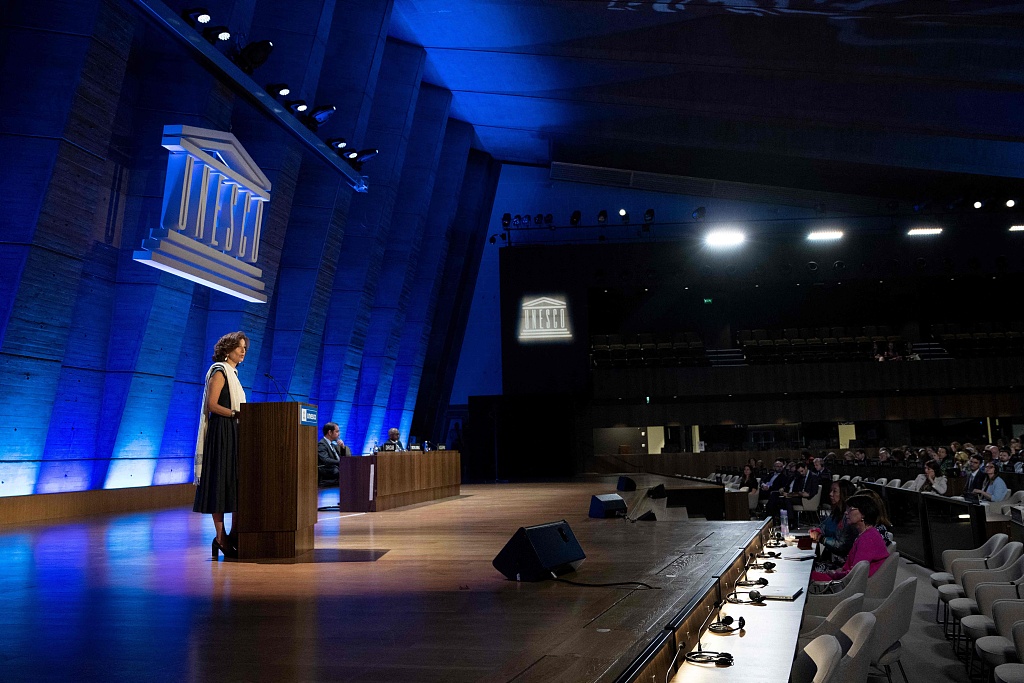 UNESCO Director-General Audrey Azoulay (L) delivers a speech to announce the United States' request to return to the institution, at the UNESCO headquarters in Paris, France, June 12, 2023. /CFP