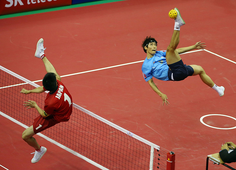Athletes participate in a Sepak Takraw game at the 2014 Incheon Asian Games, South Korea. /CFP