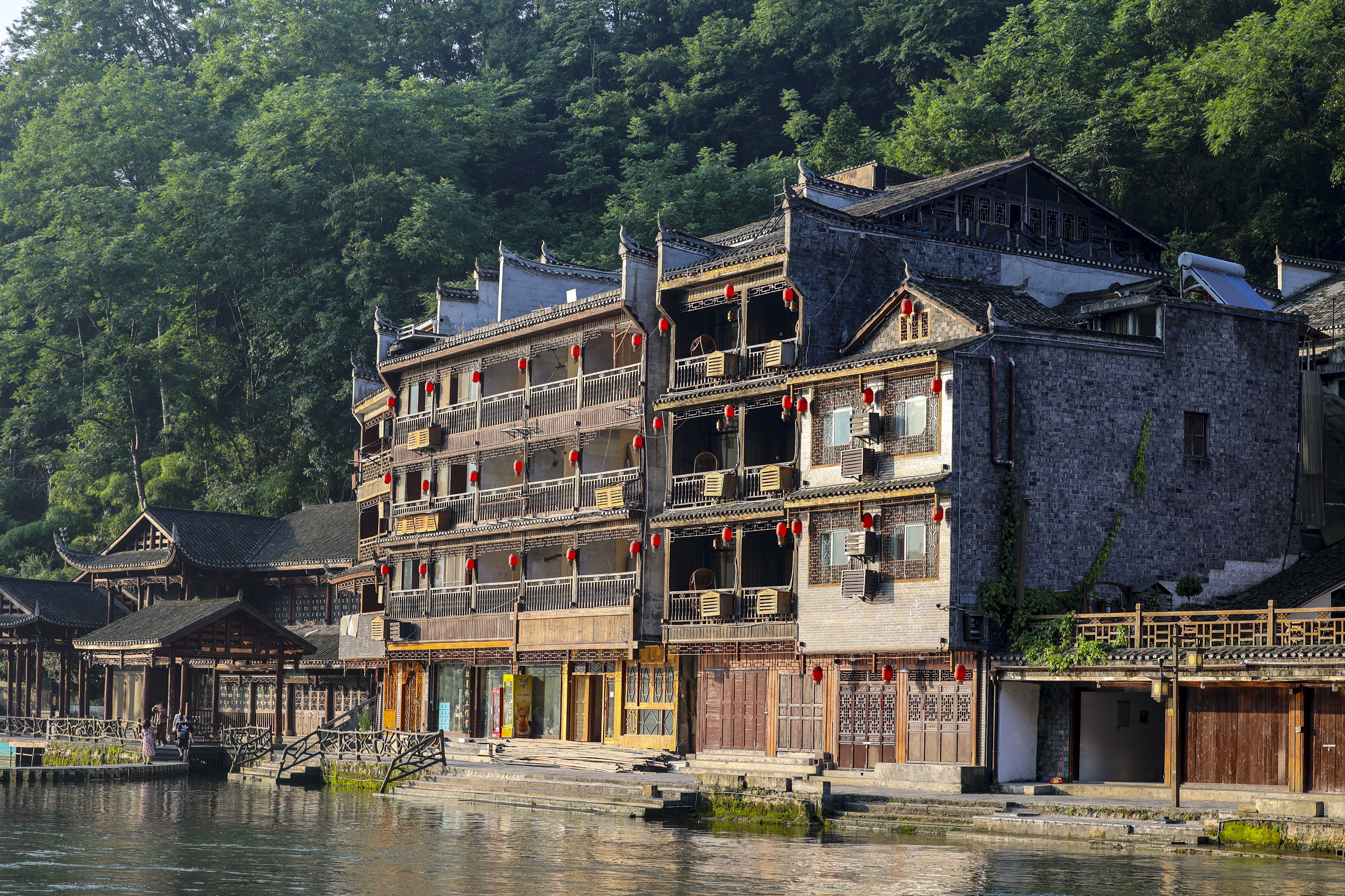 A photo shows traditional buildings in Fenghuang Ancient Town in Xiangxi, Hunan on May 29, 2023. /CNSPHOTO
