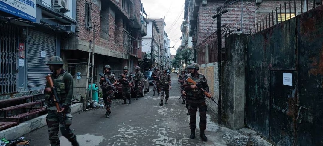 Indian army soldiers patrol during a security operation in hill and valley areas in the northeastern state of Manipur, India, June 7, 2023. /Reuters