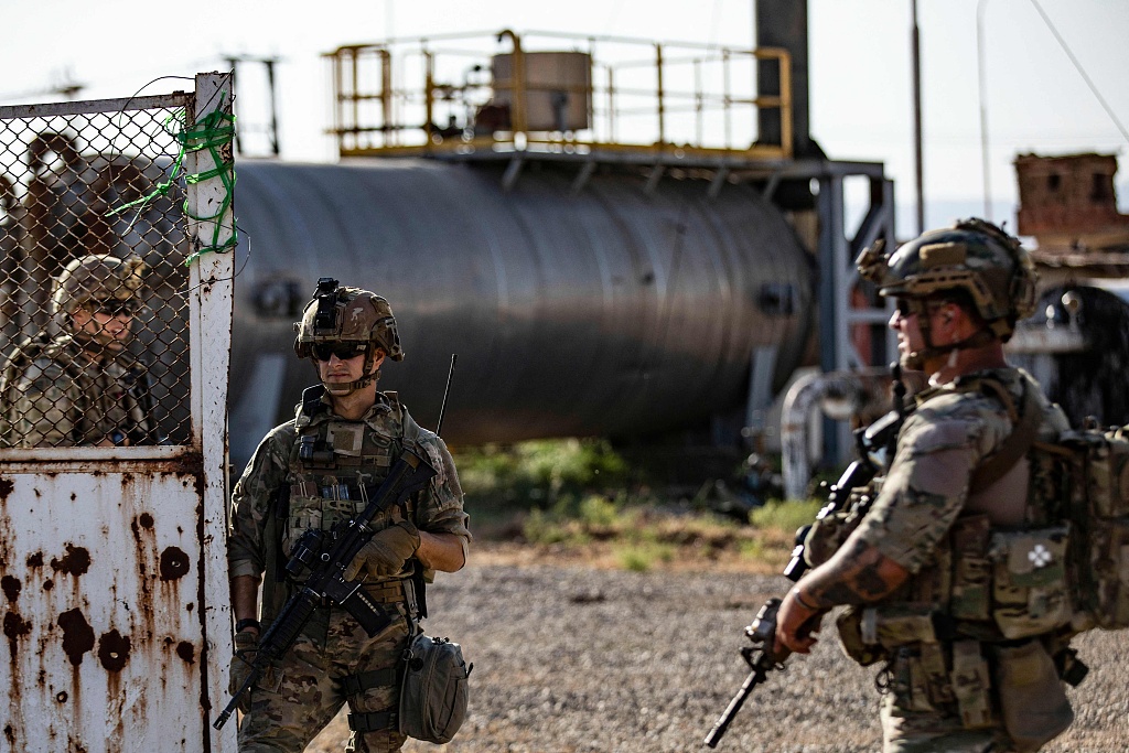 U.S. soldiers patrol near an oil field in al-Qahtaniyah in Syria's northeastern Hasakah province, June 14, 2023. /CFP