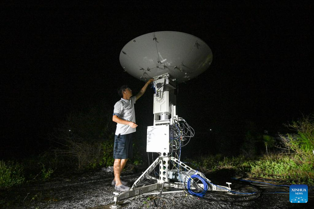 An employee tests a signal reception device for low-Earth orbit satellites at a low-Earth orbit gateway station in Lingshui Li Autonomous County, south China's Hainan Province, June 13, 2023. /Xinhua