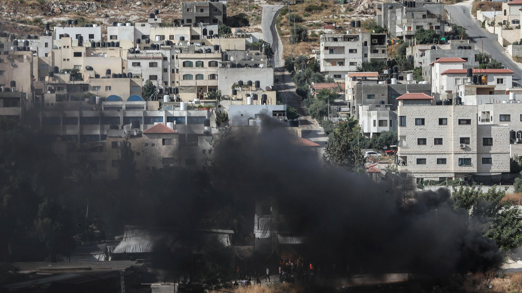 Smoke rises during an Israeli raid in Jenin in the West Bank, June 19, 2023. /CFP
