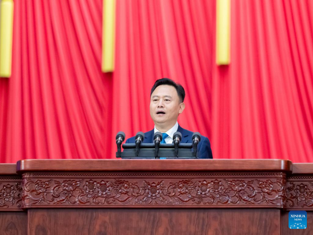 Xu Liuping, secretary of the leading Party members group of the All-China Federation of Trade Unions, extends congratulations to the 19th national congress of the CYLC, June 19, 2023. /Xinhua