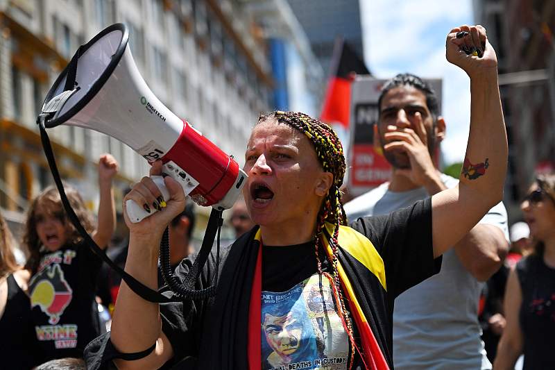 Protesters take part in a 