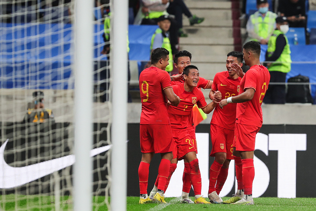China striker Wu Lei (#7) celebrates with teammates during their clash with Palestine in an international friendly in Dalian, China, June 20, 2023. /CFP