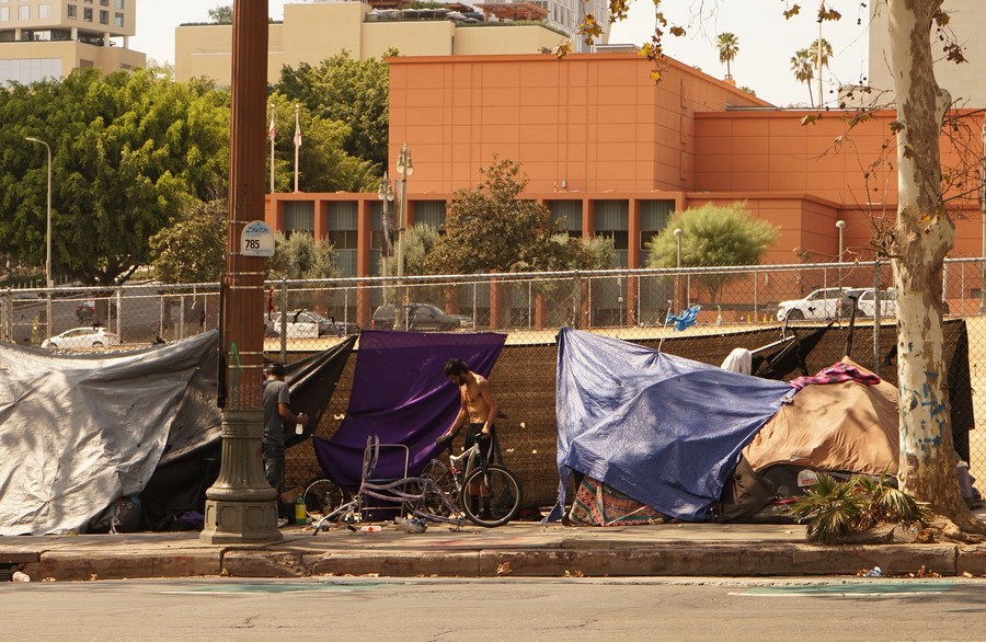 Tents housing the homeless line the sidewalk of a street in downtown Los Angeles, California, the United States, Sept. 8, 2022. /Xinhua