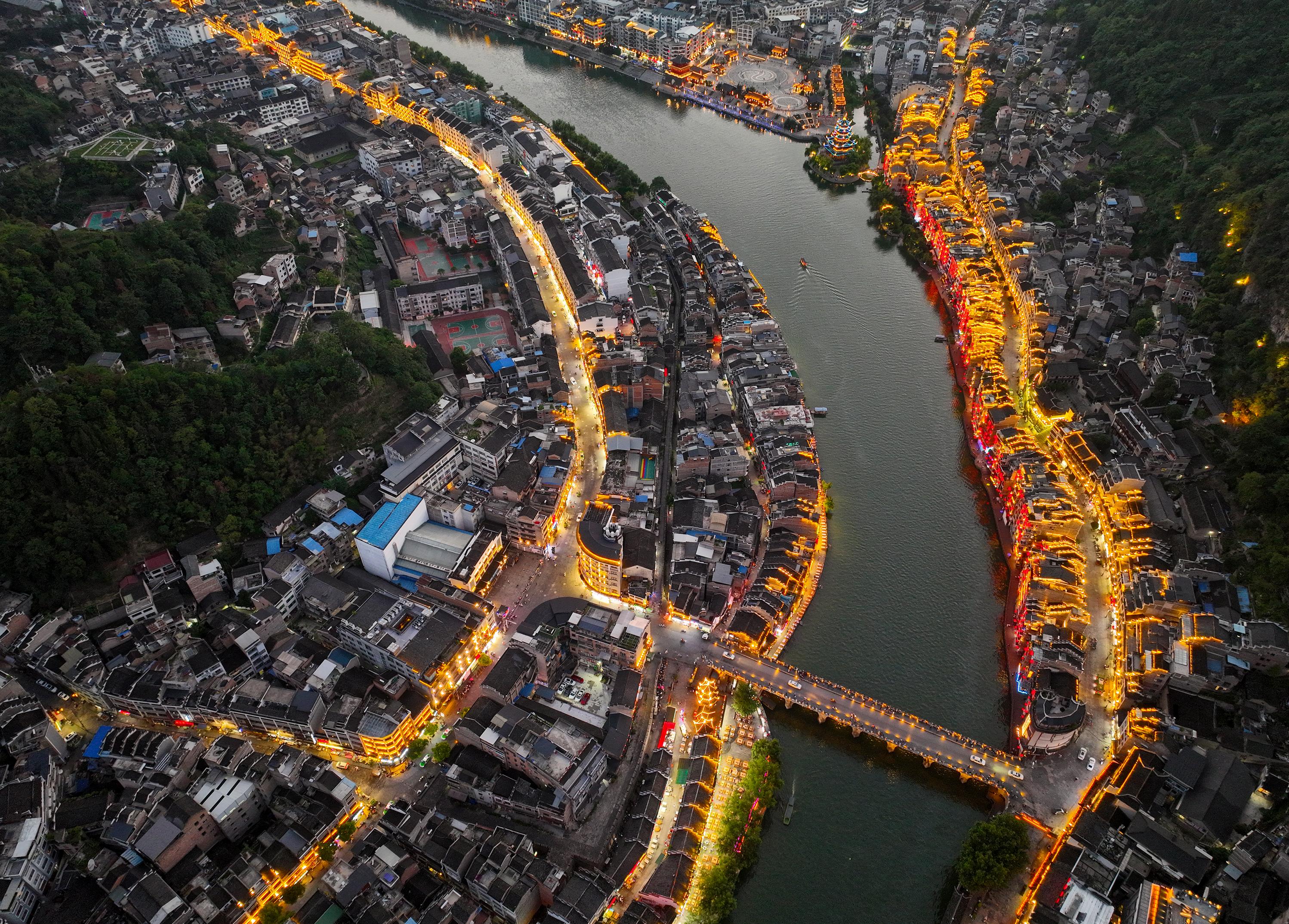 A night view of Zhenyuan ancient town in southwest China's Guizhou Province. /CNSPHOTO