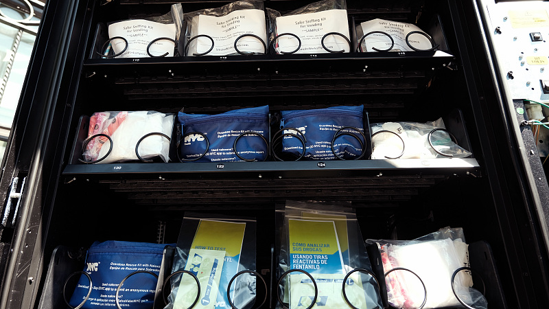 Some of the items are displayed in a new vending machine in Brooklyn that will disperse fentanyl test strips and naloxone as well as hygiene kits, maxi pads, Vitamin C, and COVID-19 tests for free, June 5, 2023. /CFP