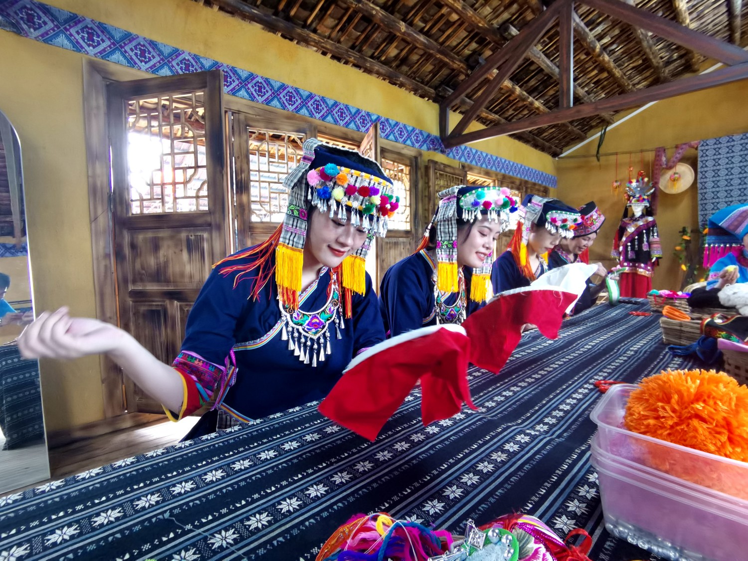 Yao people embroider dyed clothes in Hechi of south China's Guangxi Zhuang Autonomous Region, on April 23, 2023. /CNSPHOTO