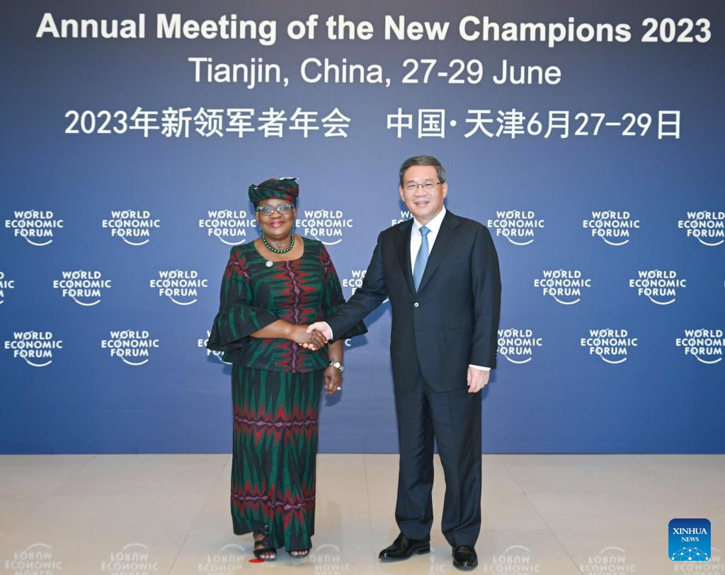 Chinese Premier Li Qiang (R) meets with Director-General of the World Trade Organization Ngozi Okonjo-Iweala in Tianjin, north China, June 26, 2023. /Xinhua