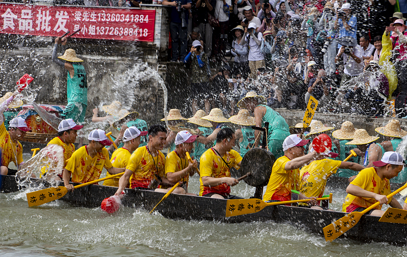 A dragon boat race is held in Foshan City, Guangdong Province, June 25, 2023. /CFP