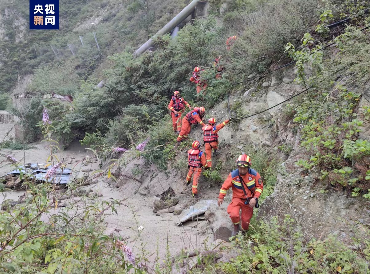 Firefighters search for the missing people after landslides in Wenchuan, Sichuan Province, June 27, 2023. /China Media Group