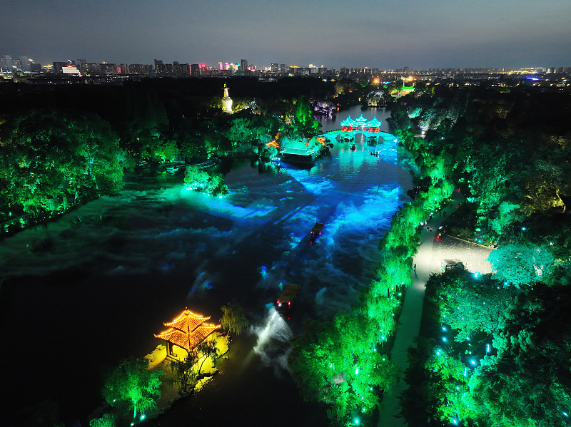 An aerial photo shows a night view of the Slender West Lake scenic area, in Yangzhou City, Jiangsu Province, June 26, 2023. /CFP